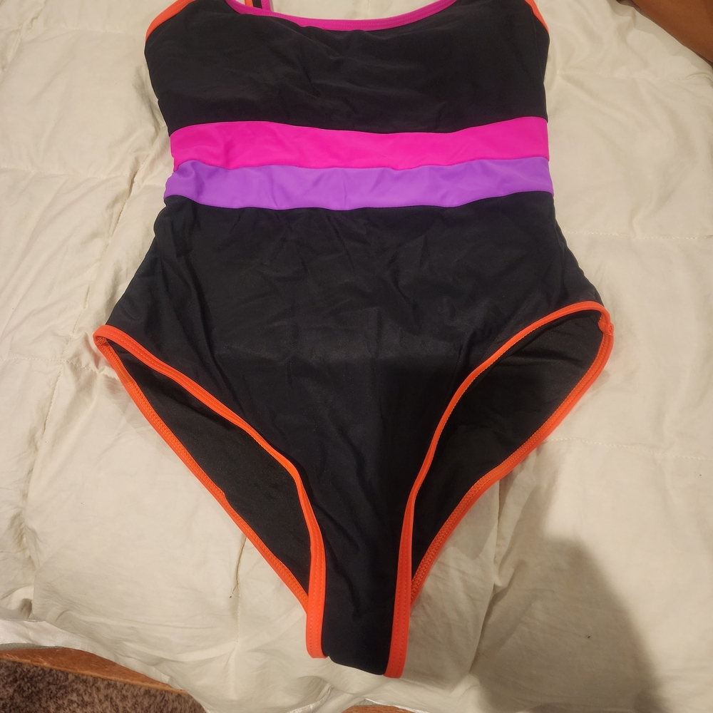 Size Medium Black Swimsuit with Pink and Purple Stripes. NWT